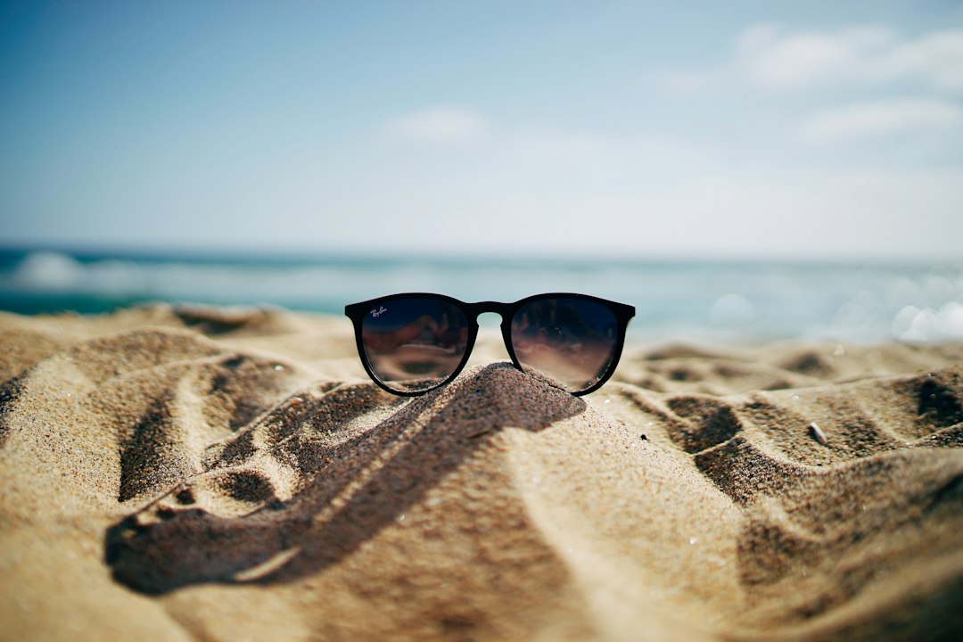 sunglasses in sang at beach